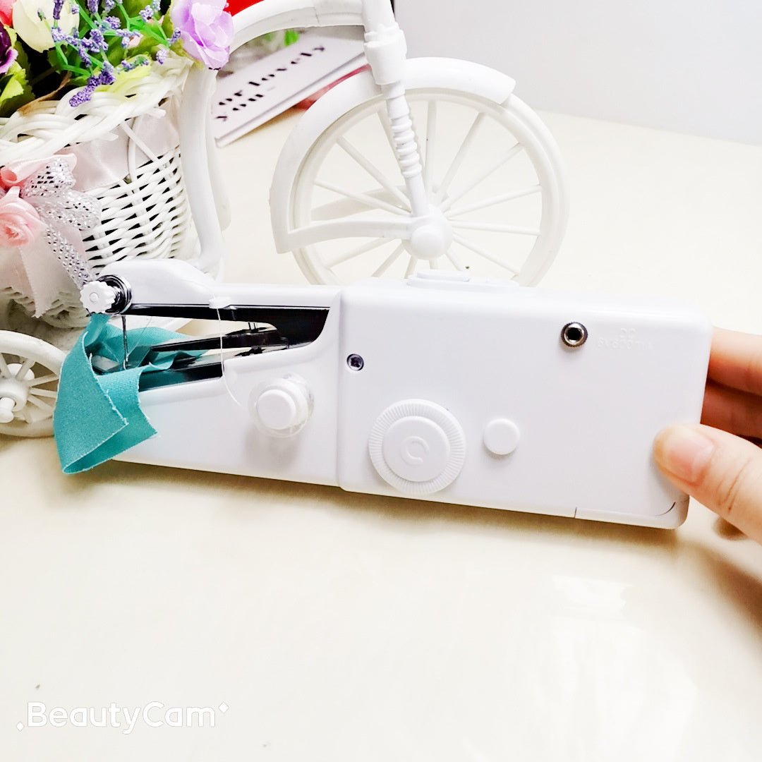 https://cdn.shopify.com/s/files/1/0777/4122/8329/files/portable-stitch-machine-928541.jpg?v=1762172783
