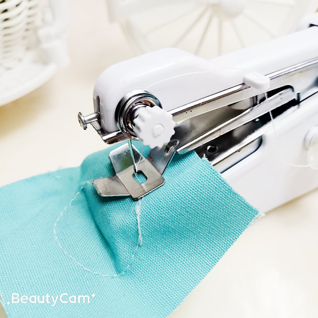 https://cdn.shopify.com/s/files/1/0777/4122/8329/files/portable-stitch-machine-995876.jpg?v=1762172783